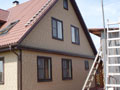Фасад - фасадные панели Zierer, Цоколь - Nailite , аксессуары - Holzplast, Кровля - Металлочерепица М35 Prisma (цвет Helios)
