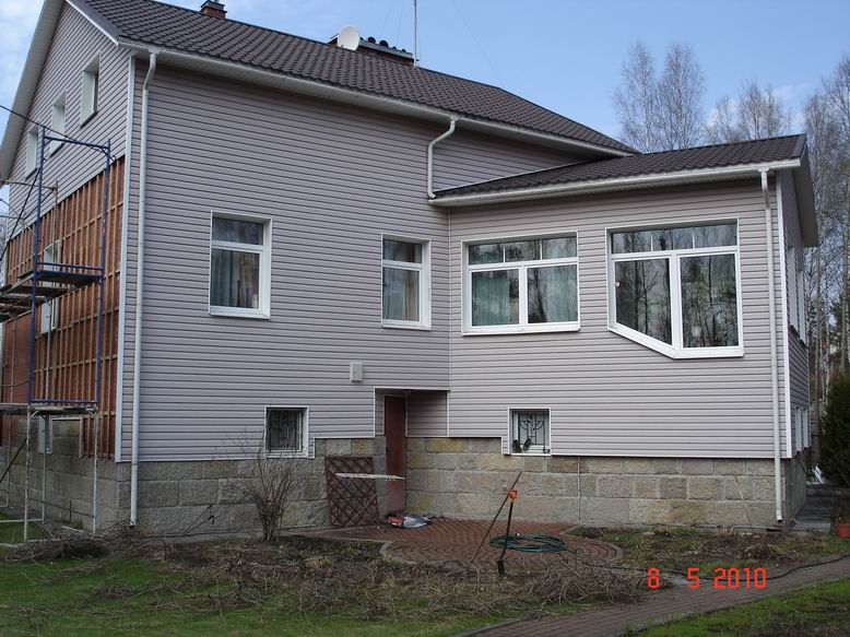 Фасад - Демонтаж сайдинга. Замена на декоративную силикатную штукатурку АТЛАС (Польша), рустик, короед с утеплителем из пенополистирола.